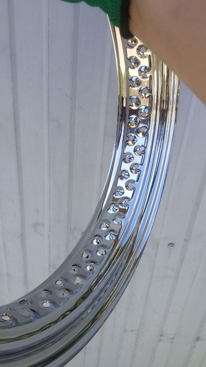 Side view of polished AISI 304 stainless steel wheel rim 18x3.0 with 80 spoke holes