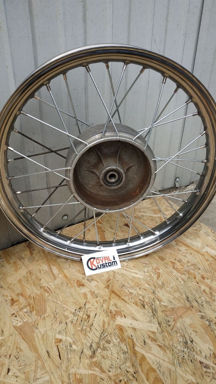 High gloss motorcycle wheel kit with matching stainless steel spokes.