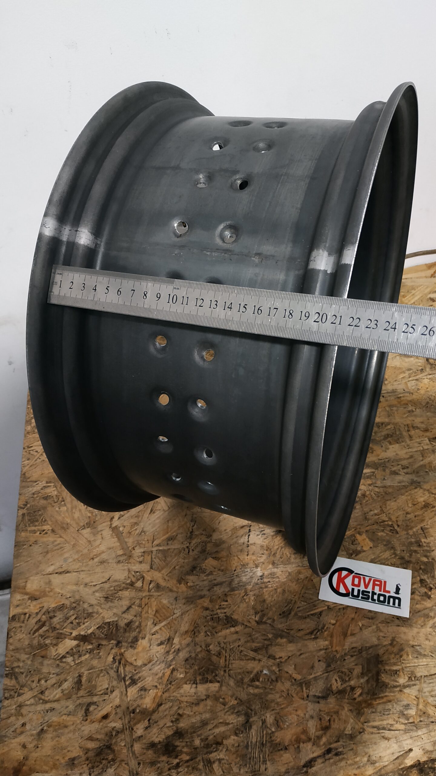 Precise 56 hole dimpled pattern layout on massive wide motorcycle hoop